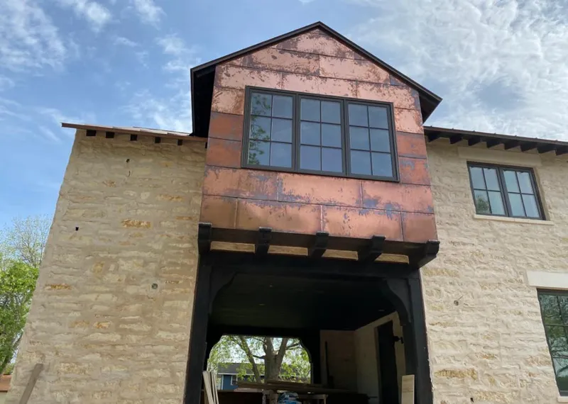 Copper metal panel facade on a stone building for Skylight Installation in San Ramon